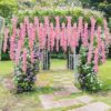 U'Artlines 12 Pack (Total 43.2 Feet) Artificial Fake Wisteria Vine Rattan Hanging Garland Silk Flowers String Home Party Wedding Decor (12, Pink)