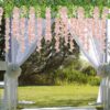 U'Artlines 12 Pack (Total 43.2 Feet) Artificial Fake Wisteria Vine Rattan Hanging Garland Silk Flowers String Home Party Wedding Decor (12, Pink)